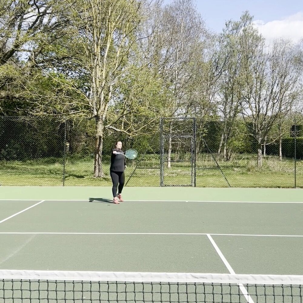 Practicing with the TopspinPro on court